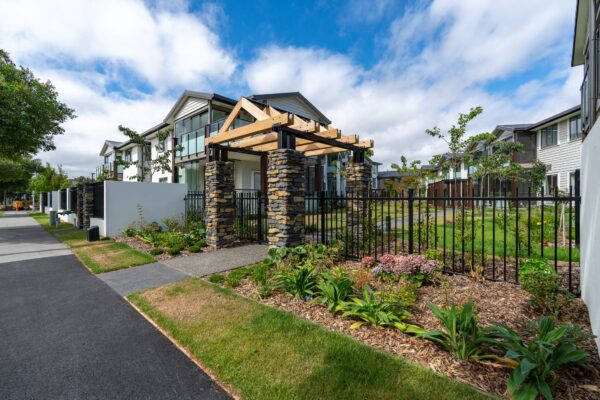 image of black metal security fence installed at Oceania Bellevue healthcare facility in Redwood designed, and installed by Axiom Built