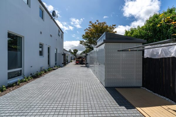 custom light grey aluminium architectural fence panels designed and installed for shed security by Axiom Built in Christchurch