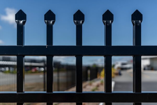 Close up of black metal industrial fencing designed, manufactured and installed by Axiom Fencing, Balustrades & Gates in Christchurch NZ